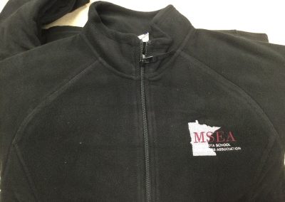 Black Fleece Zip Up with MSEA logo